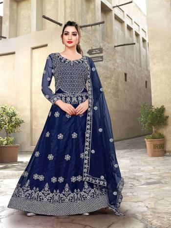 Attrective This Designer Long Length Amarkali In Lovely Color.?Its Pretty Designer Embroidery Work Top Is Butterfly Net Based Paired With Batterfly Net Fabricated Dupatta. Which Gives An Attractive To The Dress.