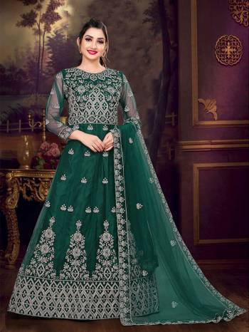 Look Attrective This Designer Long Length Amarkali In Lovely Color.?Its Pretty Designer Embroidery Work Top Is Butterfly Net Based Paired With Batterfly Net Fabricated Dupatta. Which Gives An Attractive To The Dress.