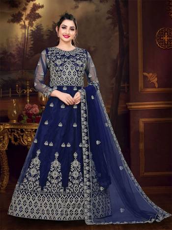 Look Attrective This Designer Long Length Amarkali In Lovely Color.?Its Pretty Designer Embroidery Work Top Is Butterfly Net Based Paired With Batterfly Net Fabricated Dupatta. Which Gives An Attractive To The Dress.