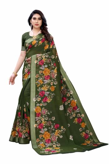 Garb This Partywear Saree Are Fine Saree Paired With Blouse.This Saree And Blouse Are Linen Fabric With Wevon Jari Border With Designer Printed. Buy This Pretty Saree Now.