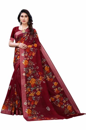 Garb This Partywear Saree Are Fine Saree Paired With Blouse.This Saree And Blouse Are Linen Fabric With Wevon Jari Border With Designer Printed. Buy This Pretty Saree Now.