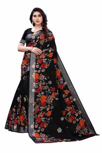 Garb This Partywear Saree Are Fine Saree Paired With Blouse.This Saree And Blouse Are Linen Fabric With Wevon Jari Border With Designer Printed. Buy This Pretty Saree Now.