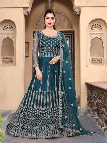 Garb This Partywear Designer Long Length Amarkali In Lovely Color.?Its Pretty Designer Embroidery Work Top Is Butterfly Net Based Paired With Batterfly Net Fabricated Dupatta. Which Gives An Attractive To The Dress.