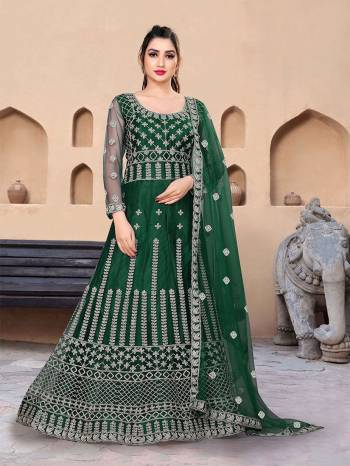 Garb This Partywear Designer Long Length Amarkali In Lovely Color.?Its Pretty Designer Embroidery Work Top Is Butterfly Net Based Paired With Batterfly Net Fabricated Dupatta. Which Gives An Attractive To The Dress.