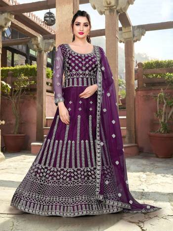 Garb This Partywear Designer Long Length Amarkali In Lovely Color.?Its Pretty Designer Embroidery Work Top Is Butterfly Net Based Paired With Batterfly Net Fabricated Dupatta. Which Gives An Attractive To The Dress.