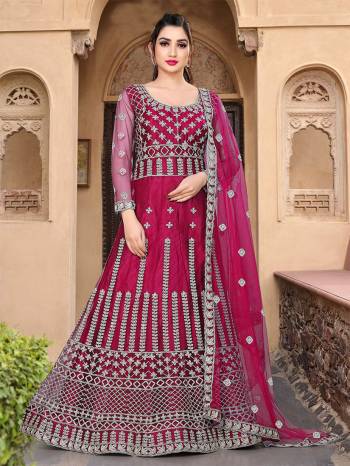 Garb This Partywear Designer Long Length Amarkali In Lovely Color.?Its Pretty Designer Embroidery Work Top Is Butterfly Net Based Paired With Batterfly Net Fabricated Dupatta. Which Gives An Attractive To The Dress.