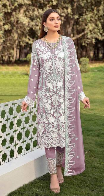 Garb This Designer Long Length Suits In Lovely Color.?Its Pretty Designer Sequance Embroidery Work Top Is Butterfly Faux Georgette Based Paired Bottom Santoon With Batterfly Nazmin Fabricated Dupatta Which Gives An Attractive To The Dress.