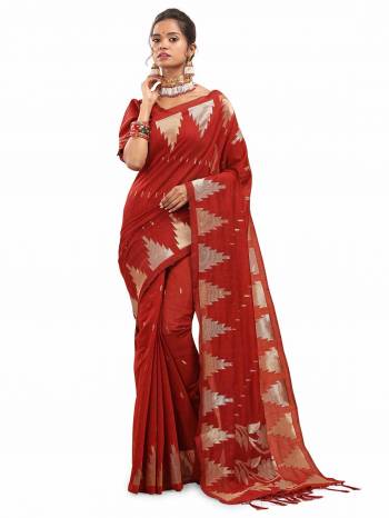 Garb This Saree Are Fine Saree Paired With Blouse.This Saree And Blouse Are Cotton Silk With Wevon Designer Work Based Fabric. Buy This Pretty Saree Now.