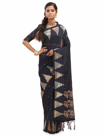 Garb This Saree Are Fine Saree Paired With Blouse.This Saree And Blouse Are Cotton Silk With Wevon Designer Work Based Fabric. Buy This Pretty Saree Now.