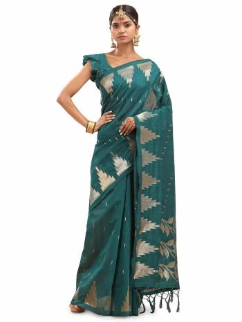 Garb This Saree Are Fine Saree Paired With Blouse.This Saree And Blouse Are Cotton Silk With Wevon Designer Work Based Fabric. Buy This Pretty Saree Now.