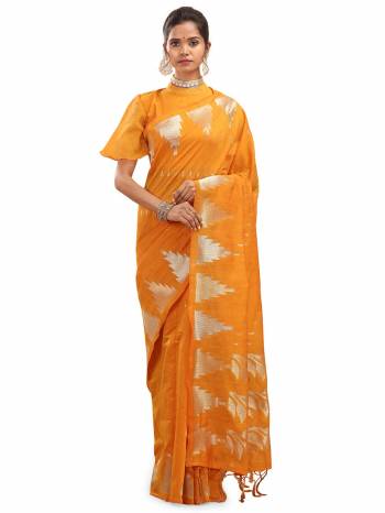 Garb This Saree Are Fine Saree Paired With Blouse.This Saree And Blouse Are Cotton Silk With Wevon Designer Work Based Fabric. Buy This Pretty Saree Now.