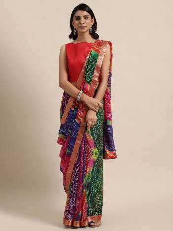 Garb This Saree Are Fine Saree Paired With Blouse.This Saree Are Georgette And Blouse Are Art Silk Fabric With Designer Bandhani Printed. Buy This Pretty Saree Now.