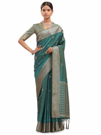 Look This Saree Are Fine Saree Paired With Blouse.This Saree And Blouse Are Silk With Wevon Designer Jari Work Based Fabric. Buy This Pretty Saree Now.