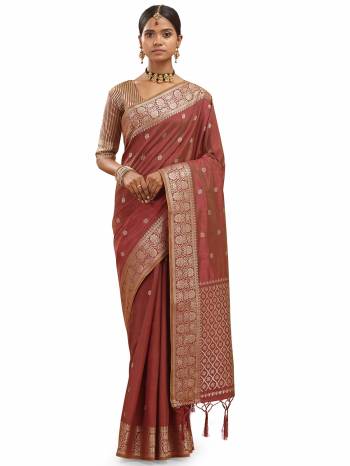 Look This Saree Are Fine Saree Paired With Blouse.This Saree And Blouse Are Silk With Wevon Designer Jari Work Based Fabric. Buy This Pretty Saree Now.