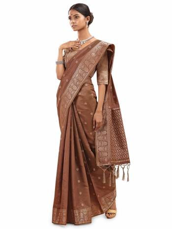 Look This Saree Are Fine Saree Paired With Blouse.This Saree And Blouse Are Silk With Wevon Designer Jari Work Based Fabric. Buy This Pretty Saree Now.