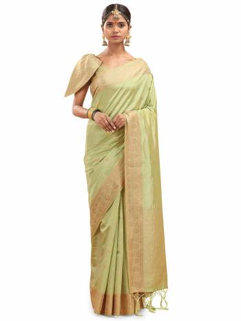 Look This Saree Are Fine Saree Paired With Blouse.This Saree And Blouse Are Silk With Wevon Designer Jari Work Based Fabric. Buy This Pretty Saree Now.