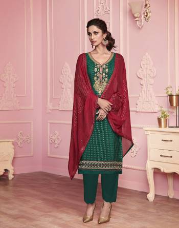 Attrective This Designer Long Length Suit In Lovely Color.?Its Pretty Designer Embroidery And Hand Work Top And Dupatta Are Georgette Based Paired With Santoon Fabricated Bottom Which Gives An Attractive To The Suit.