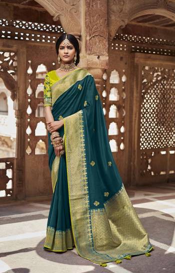 Garb This Partywear Saree Are Fine Saree Paired With Blouse.This Saree And Blouse Are Silk Fabric With Heavy Wevon Jari Designer With Embroidery Work. Buy This Pretty Saree Now.