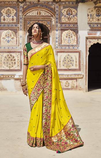 Garb This Partywear Saree Are Fine Saree Paired With Blouse.This Saree And Blouse Are Silk Fabric With Heavy Wevon Jari Designer With Embroidery Work. Buy This Pretty Saree Now.