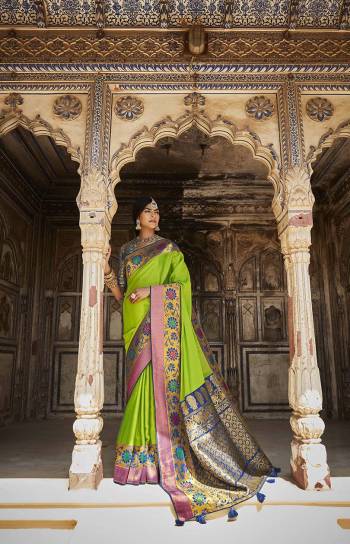 Garb This Partywear Saree Are Fine Saree Paired With Blouse.This Saree And Blouse Are Silk Fabric With Heavy Wevon Jari Designer With Embroidery Work. Buy This Pretty Saree Now.