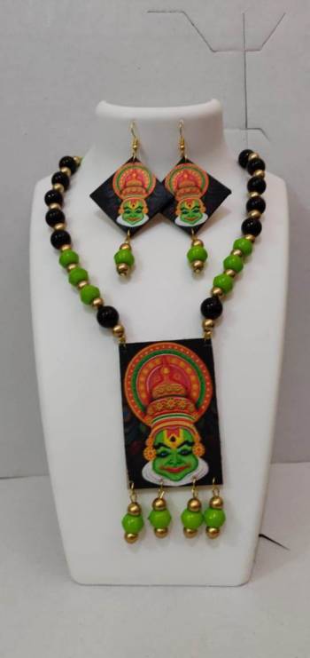 Give An Enhanced Look To Your Navratri Special This Beautiful Necklace Set With Your Ethnic Attire. This Pretty Set Is In Multy Color Beautified With Wooden Digital With Moti Work. Buy Now.