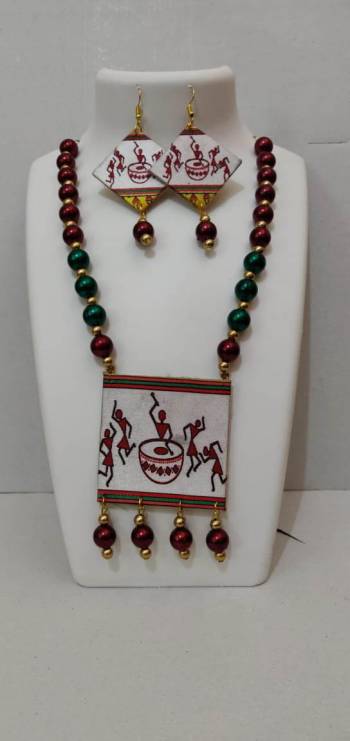 Give An Enhanced Look To Your Navratri Special This Beautiful Necklace Set With Your Ethnic Attire. This Pretty Set Is In Multy Color Beautified With Wooden Digital With Moti Work. Buy Now.