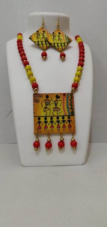 Give An Enhanced Look To Your Navratri Special This Beautiful Necklace Set With Your Ethnic Attire. This Pretty Set Is In Multy Color Beautified With Wooden Digital With Moti Work. Buy Now.