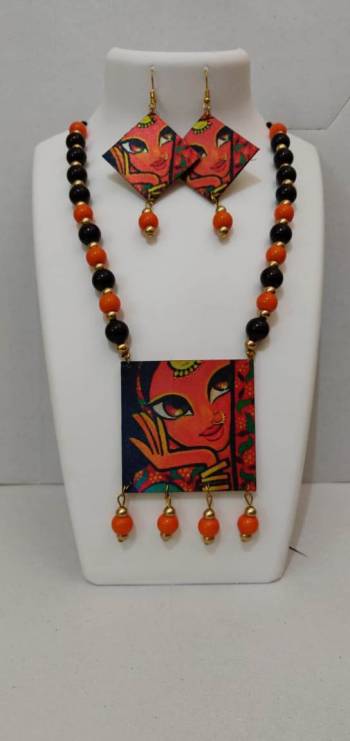 Give An Enhanced Look To Your Navratri Special This Beautiful Necklace Set With Your Ethnic Attire. This Pretty Set Is In Multy Color Beautified With Wooden Digital With Moti Work. Buy Now.