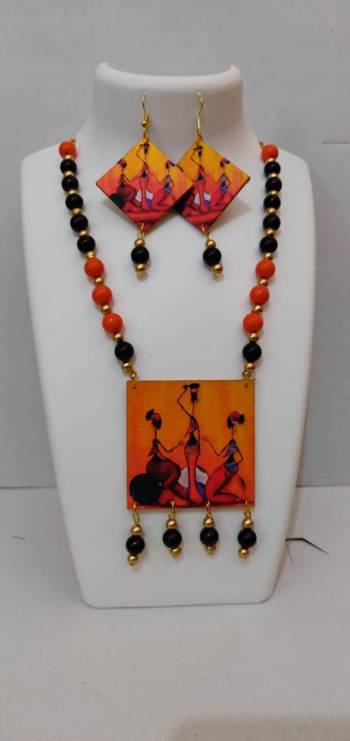 Give An Enhanced Look To Your Navratri Special This Beautiful Necklace Set With Your Ethnic Attire. This Pretty Set Is In Multy Color Beautified With Wooden Digital With Moti Work. Buy Now.