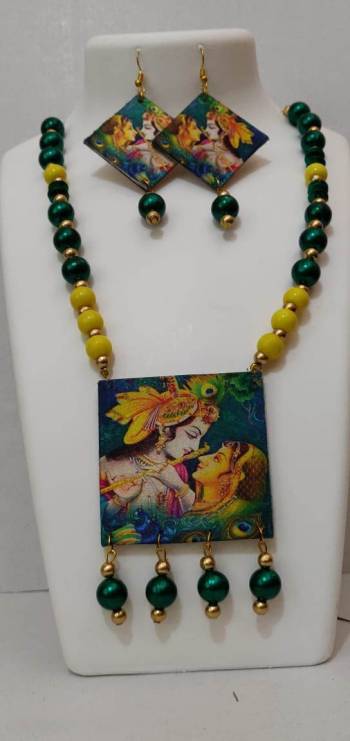 Give An Enhanced Look To Your Navratri Special This Beautiful Necklace Set With Your Ethnic Attire. This Pretty Set Is In Multy Color Beautified With Wooden Digital With Moti Work. Buy Now.