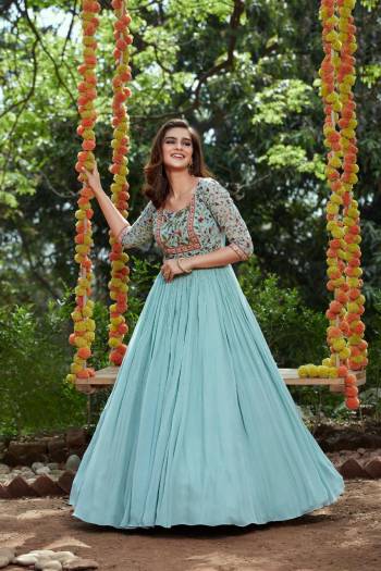 Grab This Readymade Suits In Fine Color.Top And Bottom Is Georgette Fabricated And Dupatta Are Net On Beautified With  Embroidery With Mirror Work. It Is Light In Weight And Easy To Carry All Day Long. 