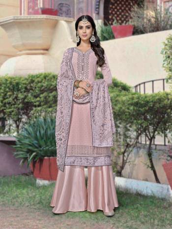 Attrective This Designer Long Length Suit In Lovely Color.?Its Pretty Designer Chain Stitch Embroidery And Masin Diamond Work Top And Dupatta Are Georgette Based Paired With Santoon Fabricated Bottom Which Gives An Attractive To The Suit.