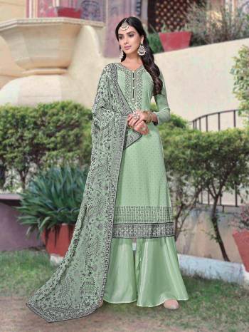 Attrective This Designer Long Length Suit In Lovely Color.?Its Pretty Designer Chain Stitch Embroidery And Masin Diamond Work Top And Dupatta Are Georgette Based Paired With Santoon Fabricated Bottom Which Gives An Attractive To The Suit.