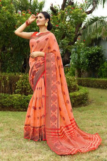 Garb This Partywear Saree Are Fine Saree Paired With Blouse.This Saree And Blouse Are Linen Fabric With Heavy Wevon Designer Embroidery Work. Buy This Pretty Saree Now.