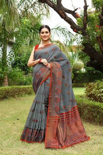 Garb This Partywear Saree Are Fine Saree Paired With Blouse.This Saree And Blouse Are Linen Fabric With Heavy Wevon Designer Embroidery Work. Buy This Pretty Saree Now.