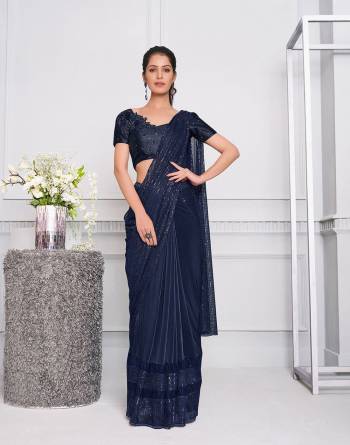 Garb This Partywear One Minute Saree Are Fine Saree Paired With Blouse.This Saree And Blouse Are Lycara Fabric With Heavy Designer Embroidery Work And Readymade Blouse. Buy This Pretty Saree Now.