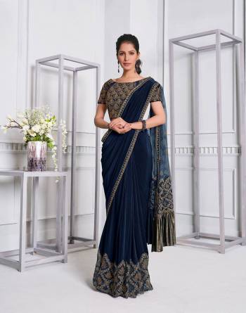 Garb This Partywear One Minute Saree Are Fine Saree Paired With Blouse.This Saree And Blouse Are Lycara & NetFabric With Heavy Designer Embroidery Work And Readymade Blouse. Buy This Pretty Saree Now.