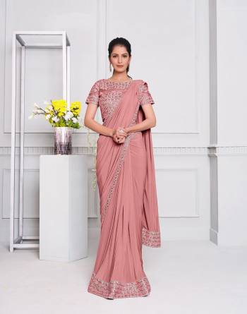 Garb This Partywear One Minute Saree Are Fine Saree Paired With Blouse.This Saree And Blouse Are Lycara Fabric With Heavy Designer Embroidery Work And Readymade Blouse. Buy This Pretty Saree Now.