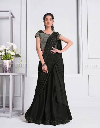 Garb This Partywear One Minute Saree Are Fine Saree Paired With Blouse.This Saree And Blouse Are Lycara Fabric With Heavy Designer Embroidery Work And Readymade Blouse. Buy This Pretty Saree Now.