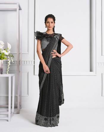 Garb This Partywear One Minute Saree Are Fine Saree Paired With Blouse.This Saree And Blouse Are Fancy Lycara Fabric With Heavy Designer Embroidery Work And Readymade Blouse. Buy This Pretty Saree Now.