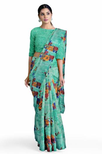 Garb This Saree Are Fine Saree Paired With Blouse.This Saree And Blouse Are Georgette Based Fabric With Designer Printed. Buy This Pretty Saree Now.