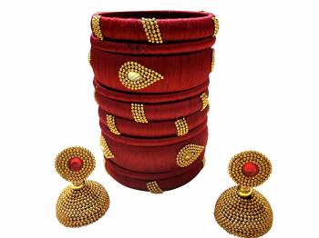 Give An Enhanced Look To Your Personality By Pairing Up This Beautiful Bengle With Earring Set With Your Ethnic Attire. This Pretty Set Is In Fine Color Beautified With Stone Work. Buy Now.