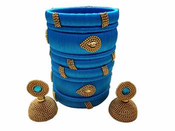 Give An Enhanced Look To Your Personality By Pairing Up This Beautiful Bengle With Earring Set With Your Ethnic Attire. This Pretty Set Is In Fine Color Beautified With Stone Work. Buy Now.