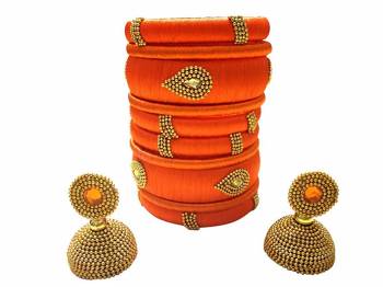 Give An Enhanced Look To Your Personality By Pairing Up This Beautiful Bengle With Earring Set With Your Ethnic Attire. This Pretty Set Is In Fine Color Beautified With Stone Work. Buy Now.