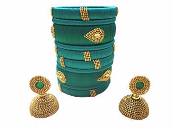 Give An Enhanced Look To Your Personality By Pairing Up This Beautiful Bengle With Earring Set With Your Ethnic Attire. This Pretty Set Is In Fine Color Beautified With Stone Work. Buy Now.