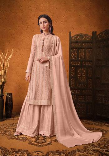 Garb This Designer Suits In Lovely Color.?Its Pretty Designer Sequance Embroidery And Hand Work Top And Bottom Is Chinon Based Paired With Chinon Fabricated Dupatta Which Gives An Attractive To The Dress.