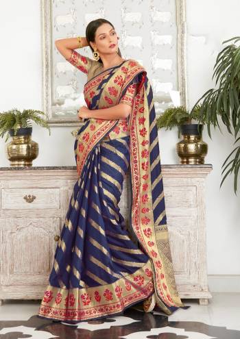 Garb This Traditional Saree Are Fine Saree Paired With Blouse.This Saree And Blouse Are Silk Based Fabric With Heavy Wevon Designer Work. Buy This Pretty Saree Now.