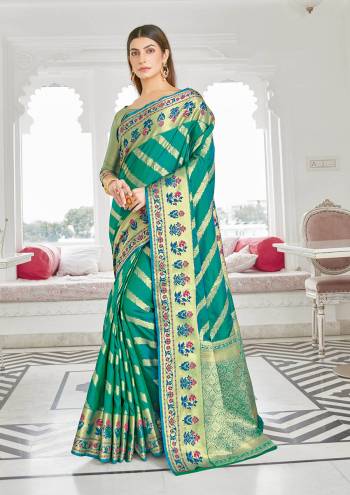 Garb This Traditional Saree Are Fine Saree Paired With Blouse.This Saree And Blouse Are Silk Based Fabric With Heavy Wevon Designer Work. Buy This Pretty Saree Now.