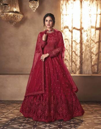 Looking This Designer Long Length Suit In Lovely Color.Its Pretty Heavy Designer Embroidery With Stone Work Top Is Butterfly Net Based Paired With Satin Bottom And Butterfly Net Fabricated Dupatta Which Gives An Attractive To The Suit.