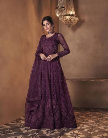 Looking This Designer Long Length Suit In Lovely Color.Its Pretty Heavy Designer Embroidery With Stone Work Top Is Butterfly Net Based Paired With Satin Bottom And Butterfly Net Fabricated Dupatta Which Gives An Attractive To The Suit.